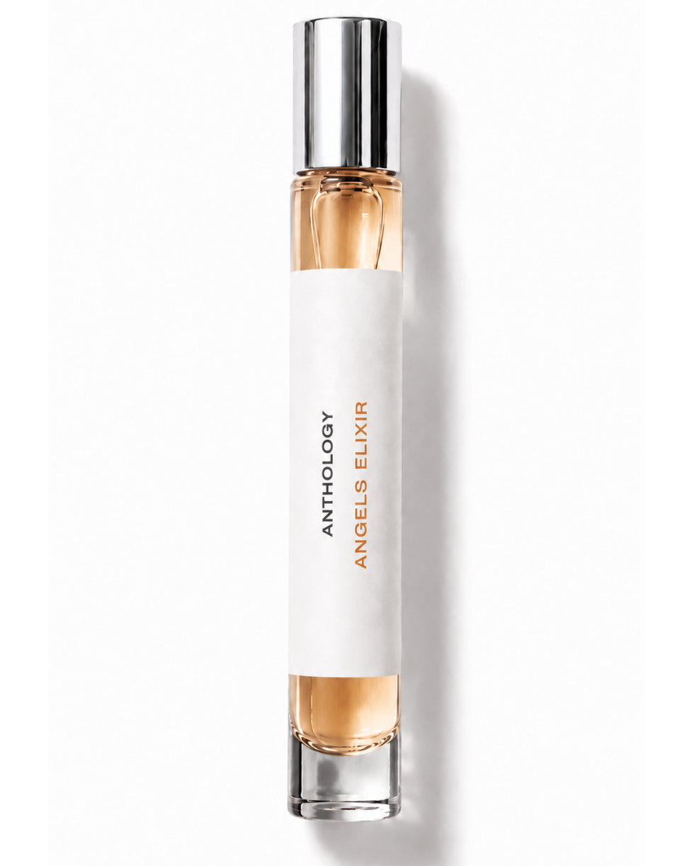 Perfume bottle with gold cap and white body on a white background